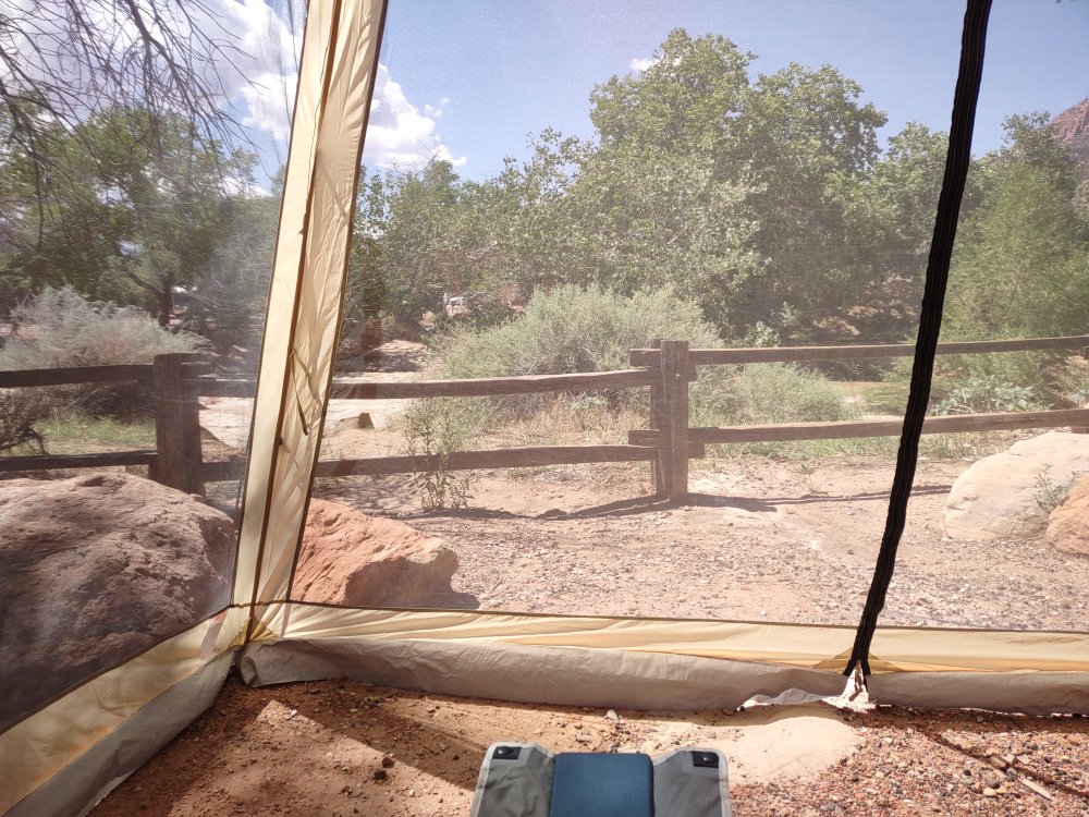 View at our campsite. The river is just beyond the fence.